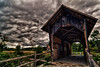 The Covered Bridge Project : In six days I drove hundreds of miles through nine different counties hunting for bridges. The pertinent road signs were often missing or blasted beyond recognition by local hunters. I relied as much on guess work as I did my handwritten directions, and on several occasions I arrived at the next bridge on my list by accident or coincidence. 
	I found and was able to document a total of twenty six bridges around the state. They seem to exist in pockets, and it was not uncommon to find three or four within a square mile. Many of them are still in active use after over a hundred years, a testament to the skill of their builders.
	As the old adage goes, it is the journey and not the destination. Taking in the state on the back roads, never going faster than 55 miles per hour, was truly a revelation. The mythical Vermont of my childhood where everyone waves and smiles as you pass is not only alive and well, it is thriving. These bridges are a gateway to Vermont's past, and those that were so quickly restored after the destruction from tropical storm Irene are a link to our future. So whether you live here or are just visiting, you owe it to yourself to seek some of these bridges out. I can say with confidence you won't regret the effort.